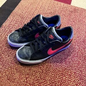 Nike Black Low-Top Sneakers with Pink Swoosh